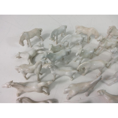 201 - Horse figures, lady figures and a vase