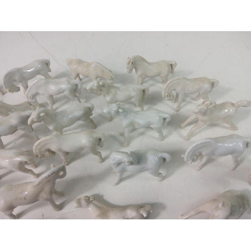 201 - Horse figures, lady figures and a vase