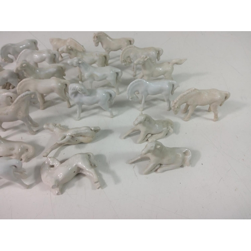 201 - Horse figures, lady figures and a vase