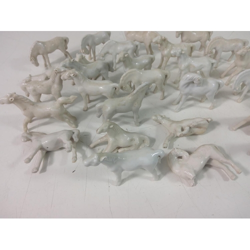 201 - Horse figures, lady figures and a vase