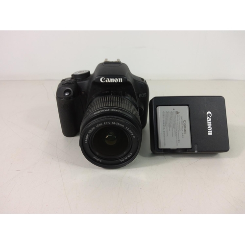 220 - Canon camera with spare battery