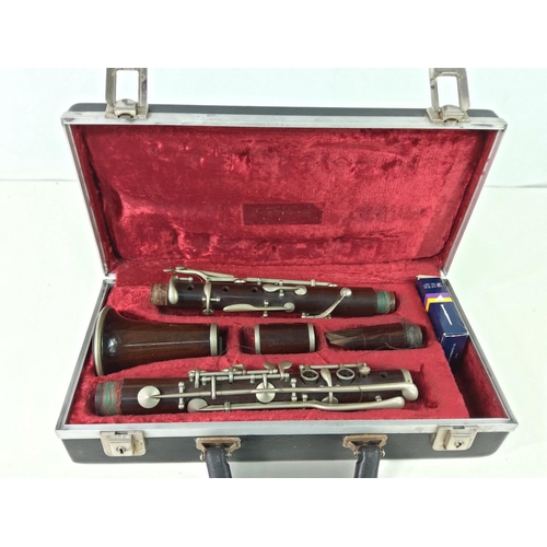 140 - Cased clarinet