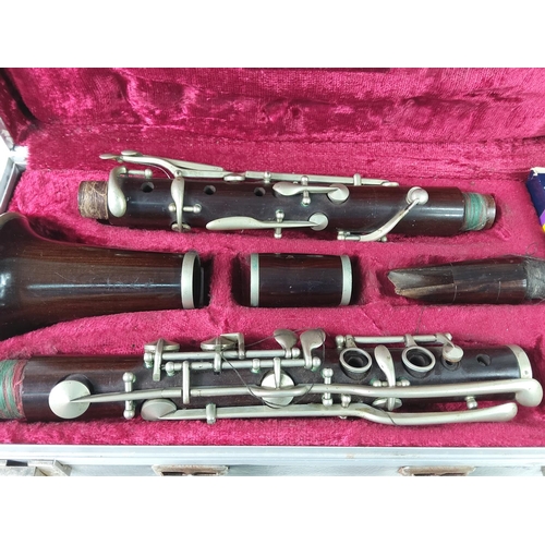 140 - Cased clarinet