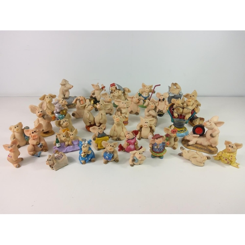 143 - Large collection of Piggin figures