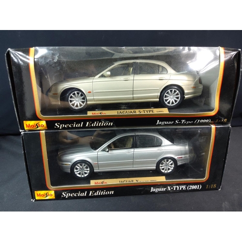 165 - 2 boxed model vehicles