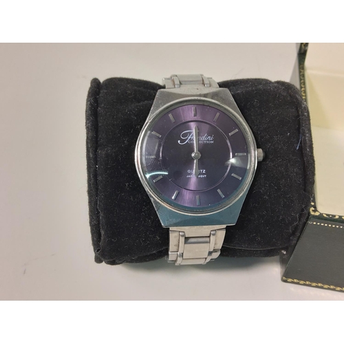 461 - Boxed wrist watch and lighter