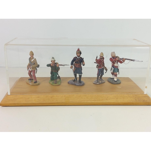 503 - Cased soldier figures