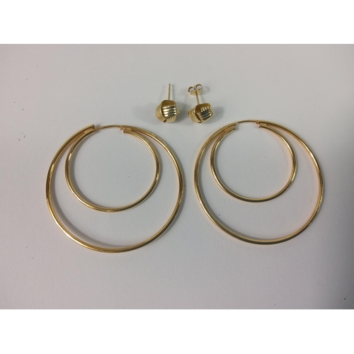 429 - Pair of gold hoop earrings and a pair of stud earrings