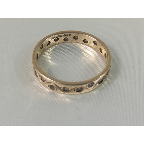 438 - 9ct gold eternity ring, size N, 2.1g gross