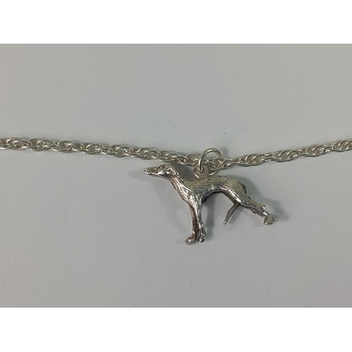 444 - Silver dog pendant on chain, 13.9g gross