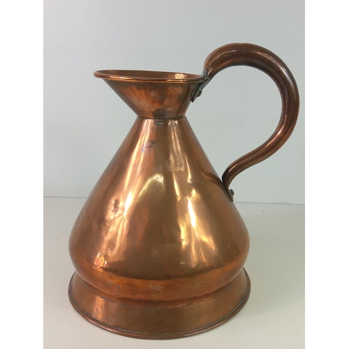 128 - Large antique copper jug