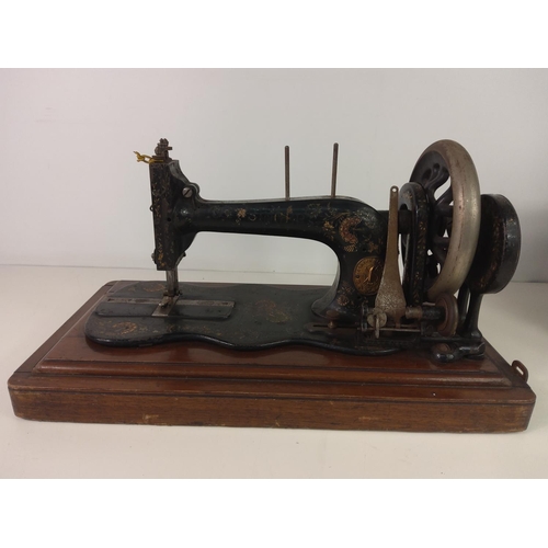 131 - Cased sewing machine
