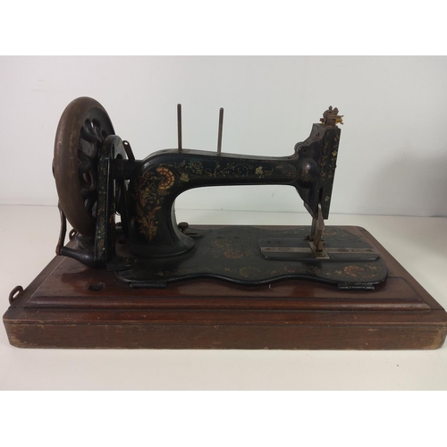 131 - Cased sewing machine