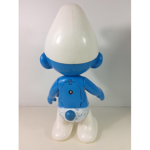 285 - Large vintage Smurf model complete including battery box, approx 50cms tall