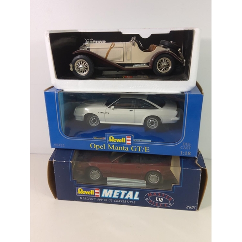 275 - 2 boxed and one unboxed model vehicles