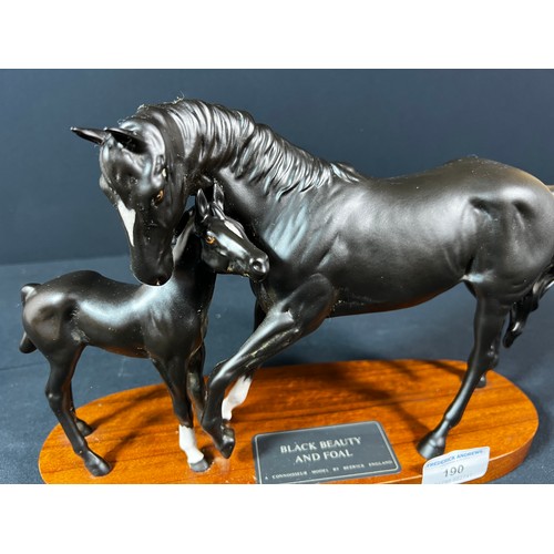 190 - Beswick black beauty and foal