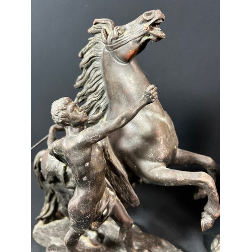 180 - Pair of cast bronze Marley horses - each overall height 30cm