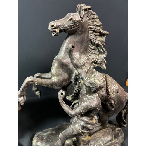 180 - Pair of cast bronze Marley horses - each overall height 30cm