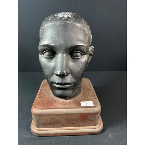 166 - Life size cast aluminum head on wooden plinth - overall height approx 35cm