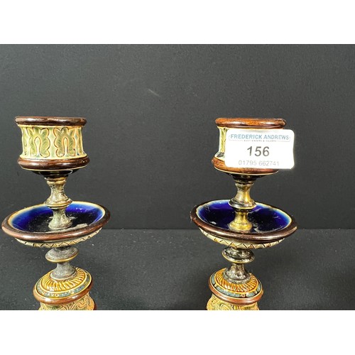 156 - Pair of Royal Doulton lambeth Brass and porcelain candlesticks - 21cm tall