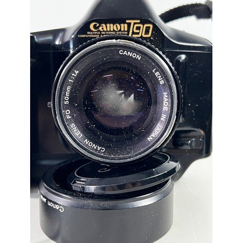 354 - Canon T90 camera and lens