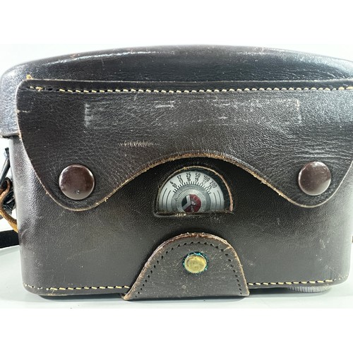 352 - Vintage leather cased Leica D8pm3 camera and lens