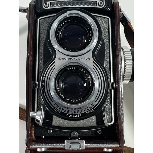 348 - Rolleiflex leather cased camera