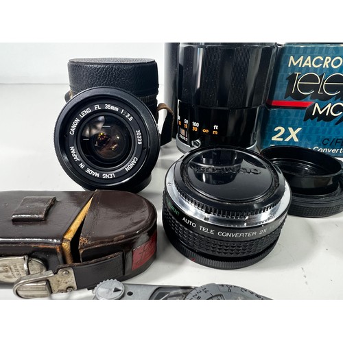 345 - 2 Cased Canon lenses, Ofuna lens and other accessories