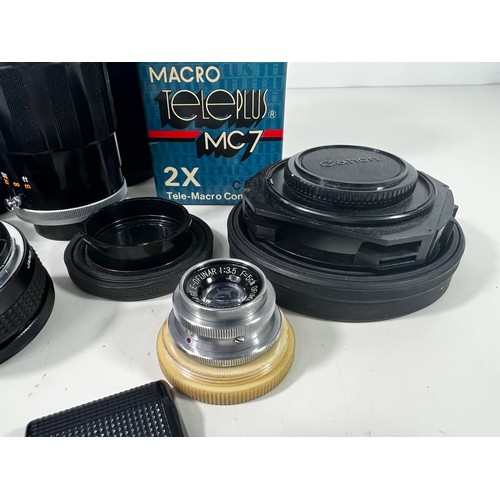 345 - 2 Cased Canon lenses, Ofuna lens and other accessories