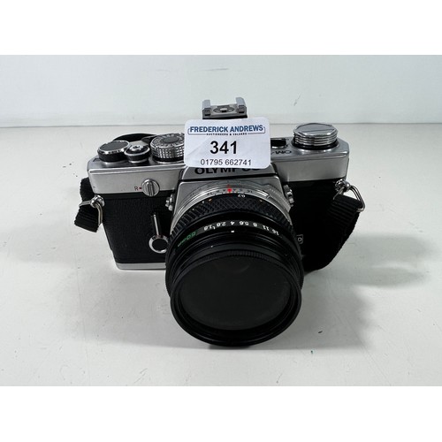 341 - Olympus OM1 camera and lens