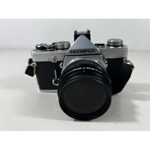 341 - Olympus OM1 camera and lens