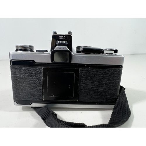 341 - Olympus OM1 camera and lens