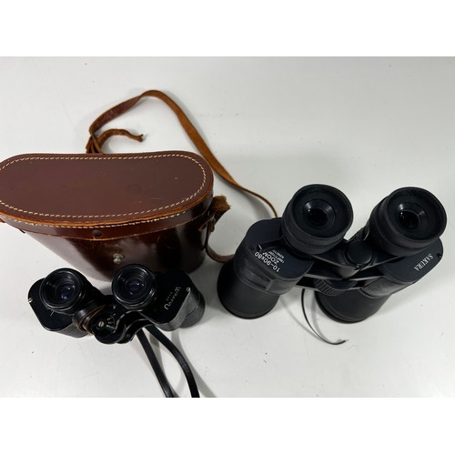 321 - 2 pairs of cased binoculars