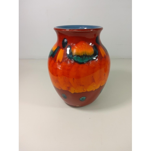 134 - Large Poole vase (24cm tall) and small Poole vase -(11cm tall)