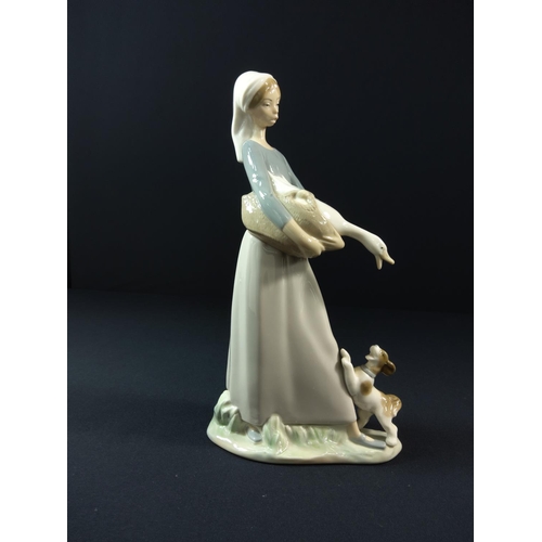 34 - Lladro girl with dog and goose