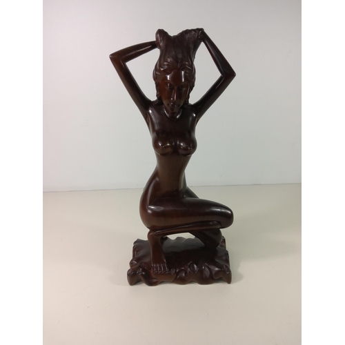 73 - Polynesian carved hardwood figure of a nude lady - overall height 45cm