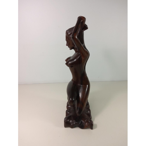 73 - Polynesian carved hardwood figure of a nude lady - overall height 45cm