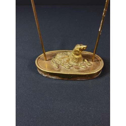 76 - Cast brass dog figure candle holder