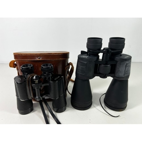 321 - 2 pairs of cased binoculars