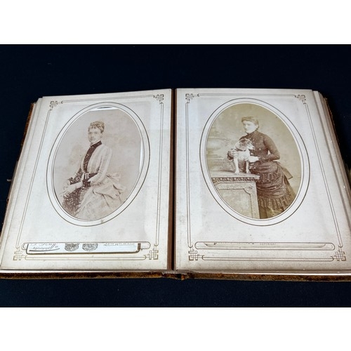 170 - Antique photo album and contents