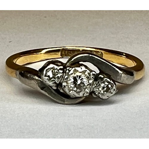 449 - 18ct gold and diamond 3 stone twist ring SIZE K