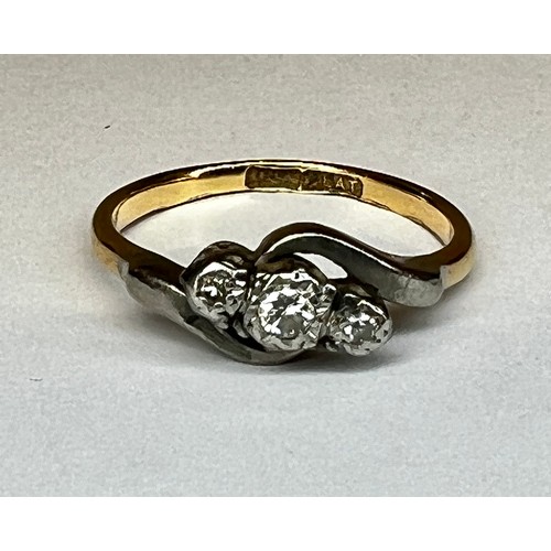 449 - 18ct gold and diamond 3 stone twist ring SIZE K