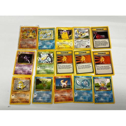 578 - Quantity of vintage Pokemon cards (including shiny Charizard) and boxed book of printed plates