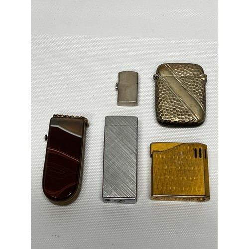 582 - 3 vintage lighters, metal vesta and stone set vesta