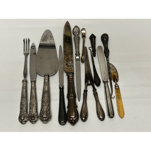 744 - Quantity of silver handled and silver bladed items