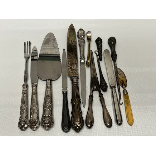 744 - Quantity of silver handled and silver bladed items