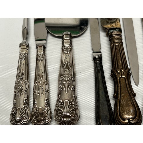 744 - Quantity of silver handled and silver bladed items