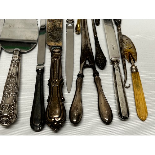 744 - Quantity of silver handled and silver bladed items