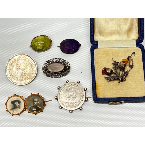 631 - Antique and vintage brooches including stone set, coin set and silver