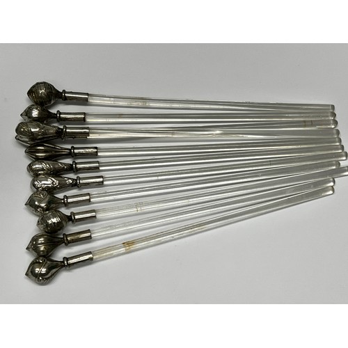 652 - 11 Silver topped cocktail stirrers